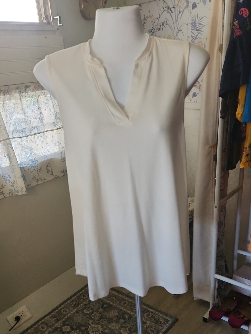 White Sleeveless Top